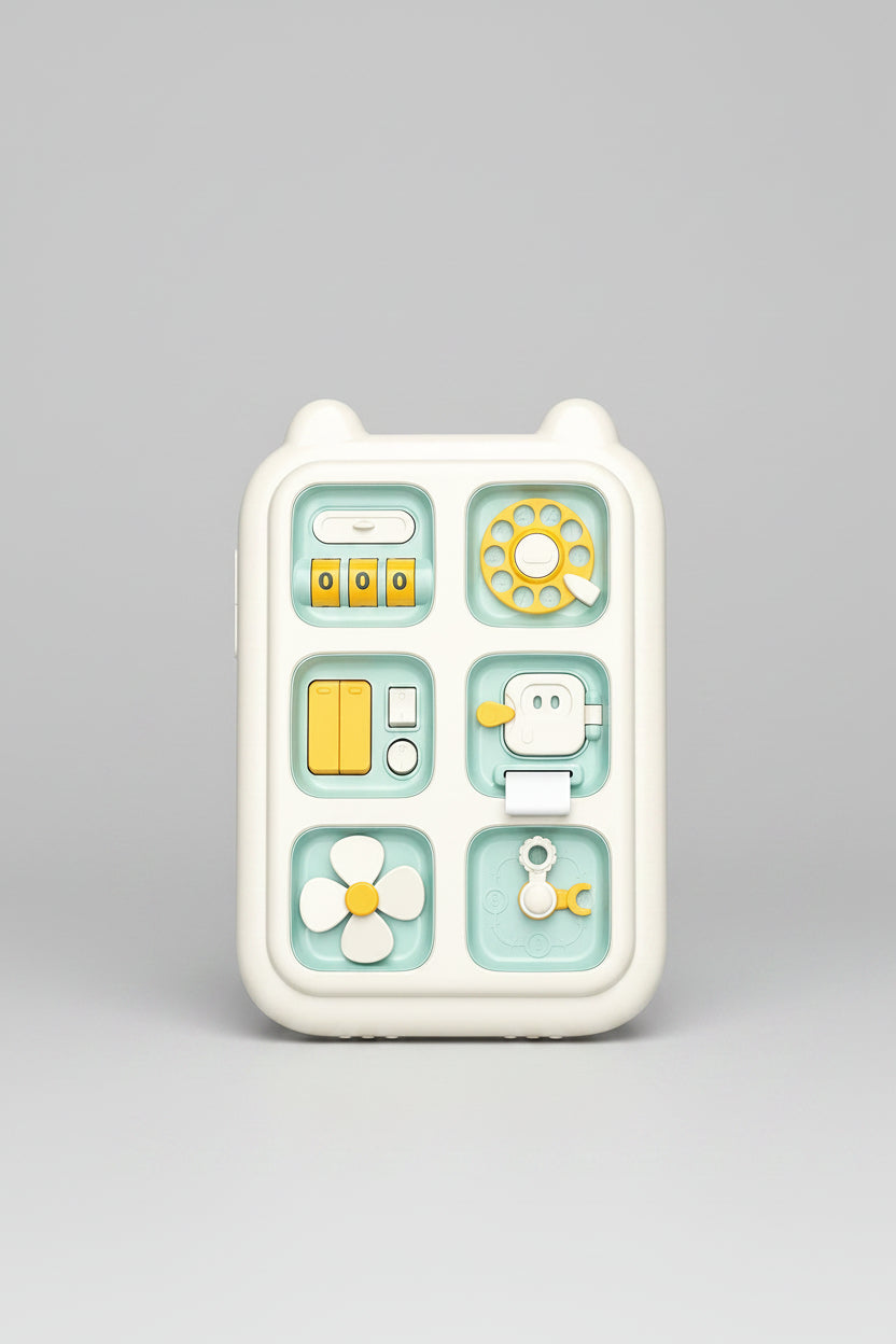 Children's educational toy with various shapes and colors on a wooden surface.