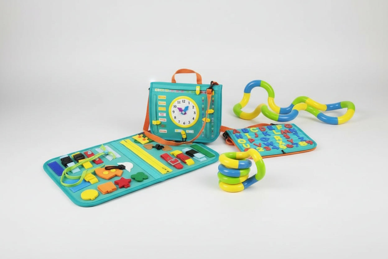 Educational toy set with colorful rings and a fabric book.