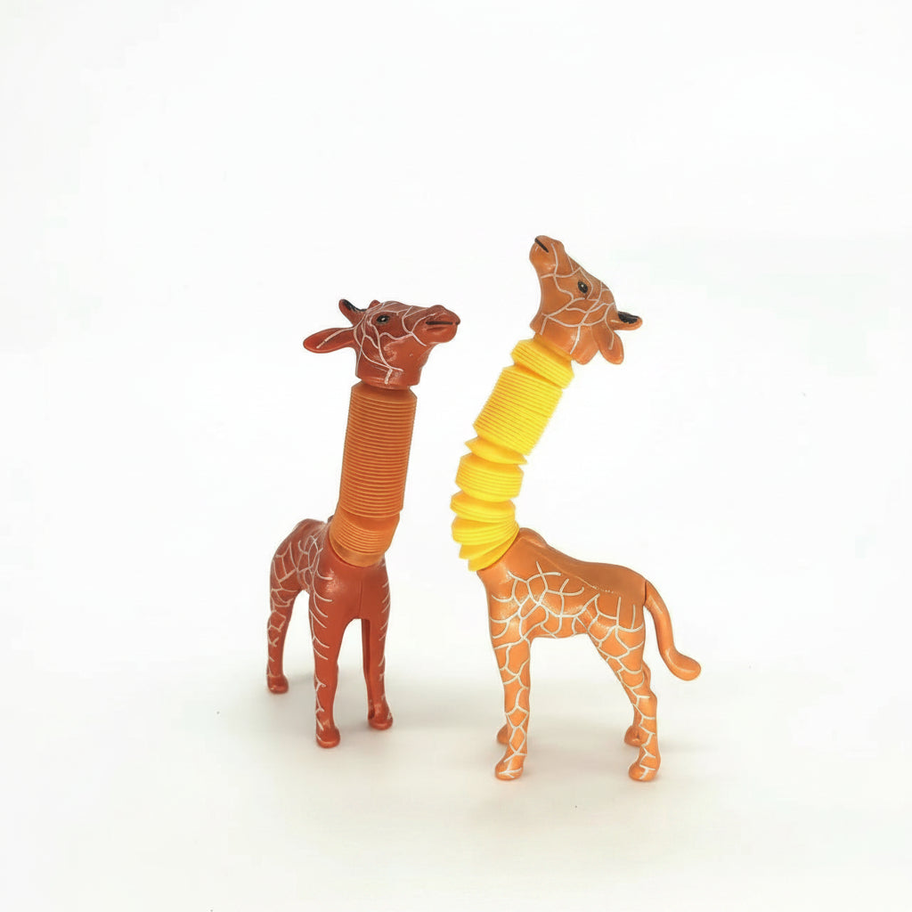Two giraffe figurines with colorful necks on a white background